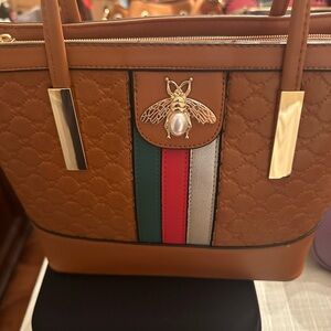 Elegant Brown Designer Tote Bag with Gold Accents